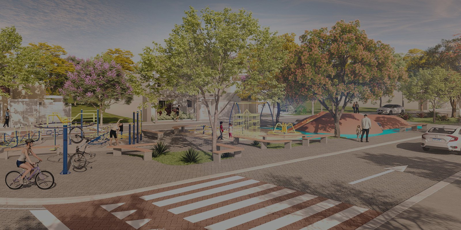 Perspectiva da praça do Sweet Village com playground, árvores e ruas urbanizadas